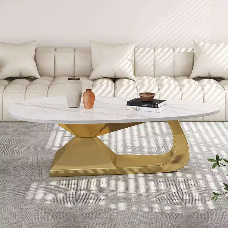 Tavolino con piano in ceramica e base contemporanea in acciaio inox, un elemento d'arredo durevole ed elegante per il soggiorno