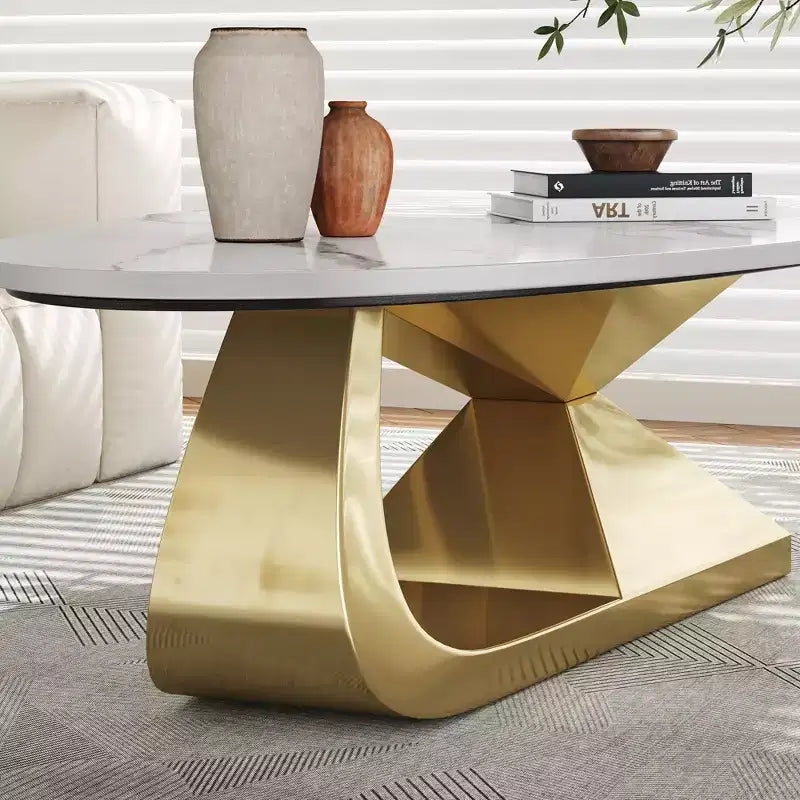 Tavolino con piano in ceramica e base contemporanea in acciaio inox, un elemento d'arredo durevole ed elegante per il soggiorno