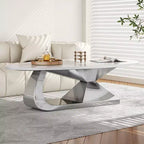 Tavolino con piano in ceramica e base contemporanea in acciaio inox, un elemento d'arredo durevole ed elegante per il soggiorno