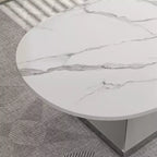 Tavolino con piano in ceramica e base contemporanea in acciaio inox, un elemento d'arredo durevole ed elegante per il soggiorno