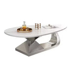 Tavolino con piano in ceramica e base contemporanea in acciaio inox, un elemento d'arredo durevole ed elegante per il soggiorno