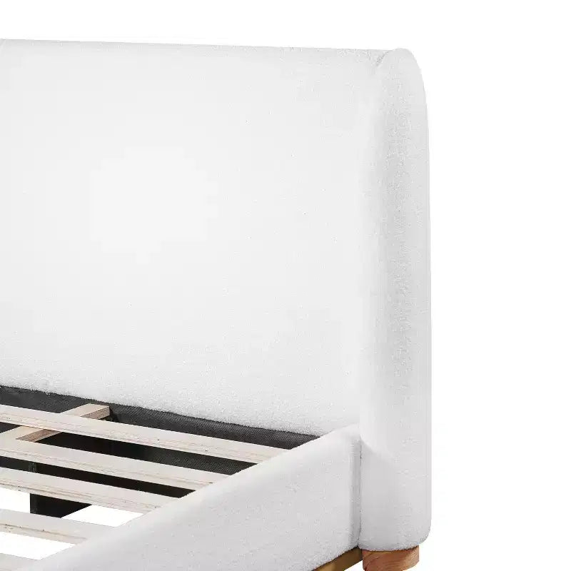 Struttura letto in legno con rivestimento Bouclé, base e testiera integrati