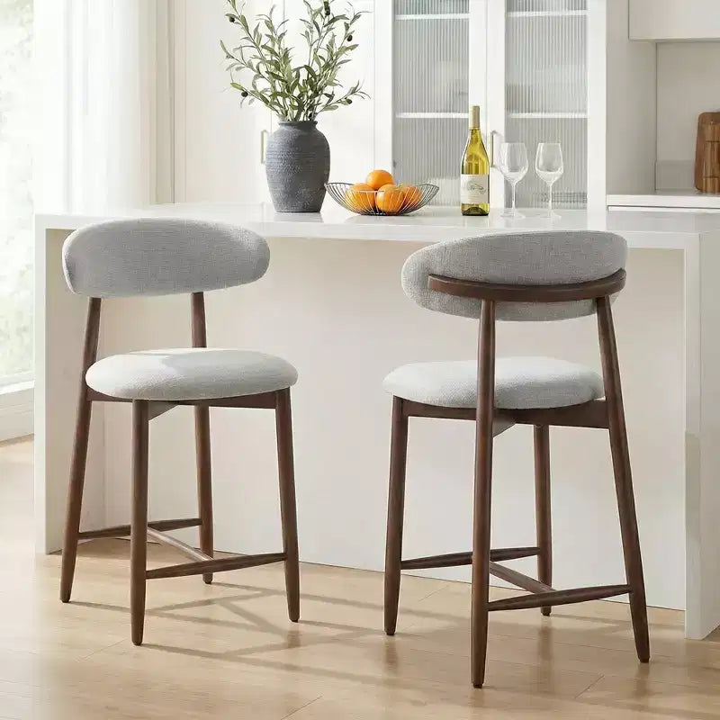 Sgabello da bar imbottito altezza bancone con rivestimento in tessuto e finitura in noce